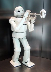 A humanoid robot "playing" a trumpet